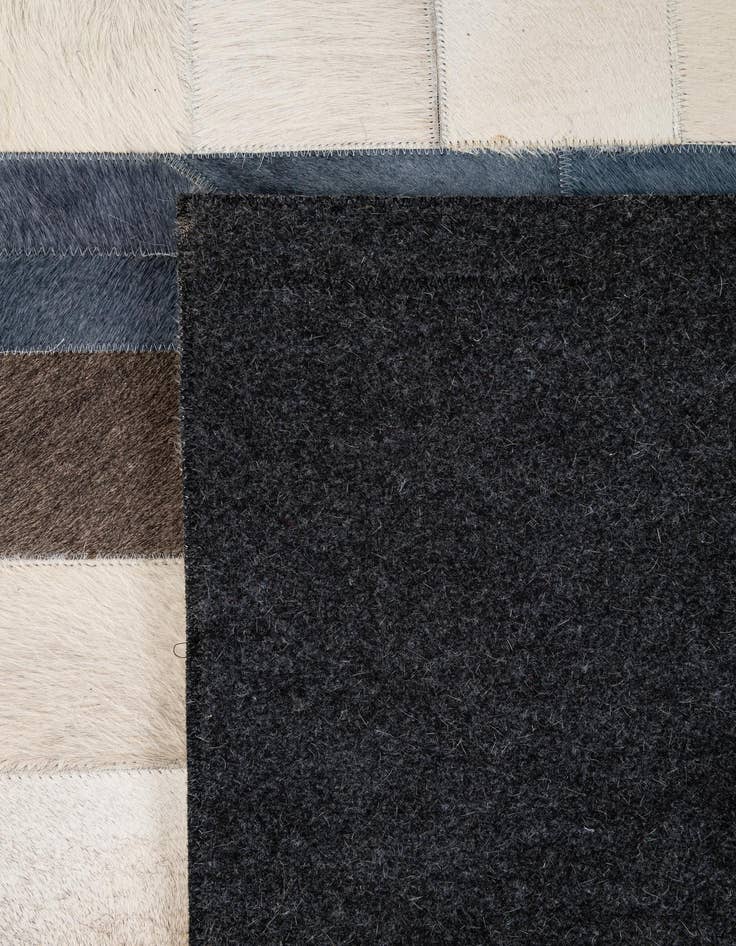 Detail image of  5' 1 x 7' 11 Cowhide - Patchwork Rug