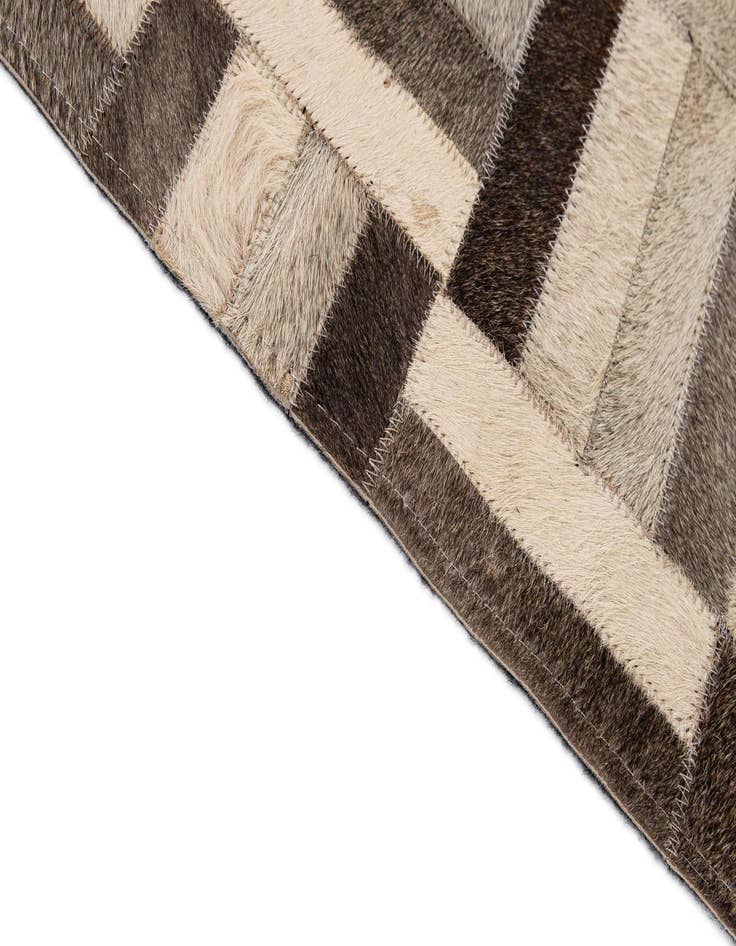 Detail image of  5' 5 x 8' 2 Cowhide - Patchwork Rug