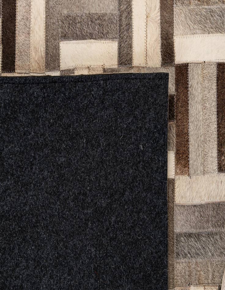 Detail image of  5' 5 x 8' 2 Cowhide - Patchwork Rug