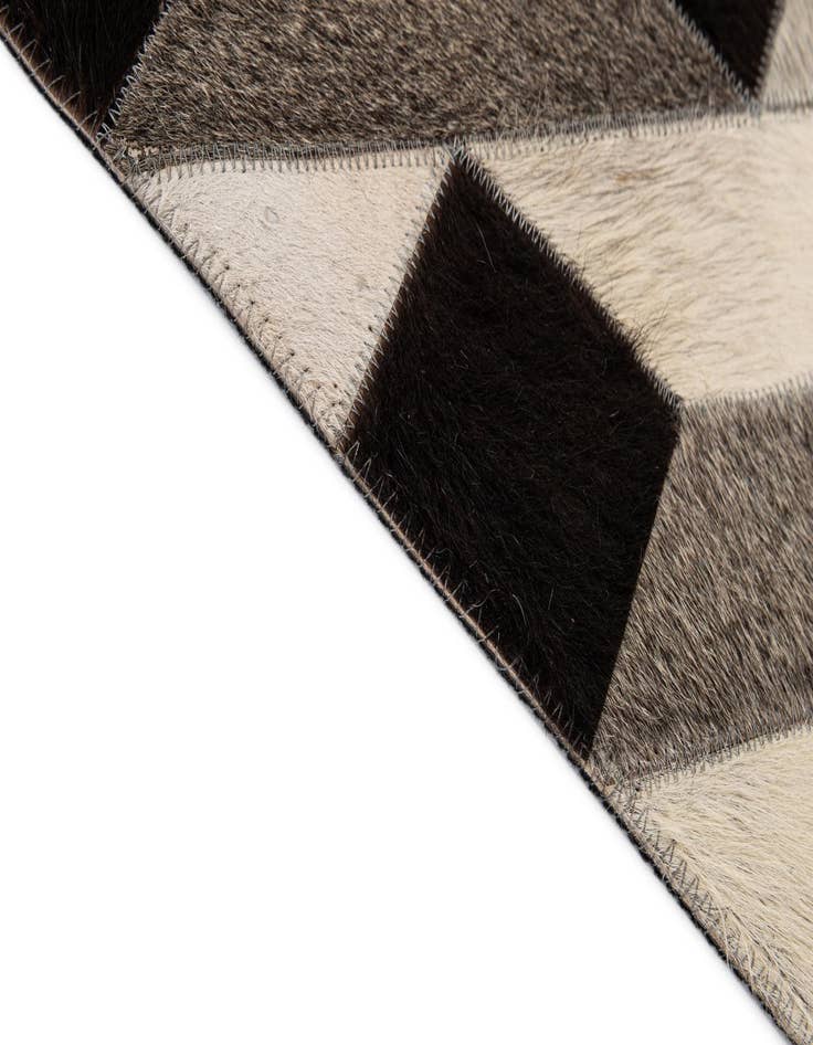 Detail image of  5' 2 x 8' 2 Cowhide - Patchwork Rug