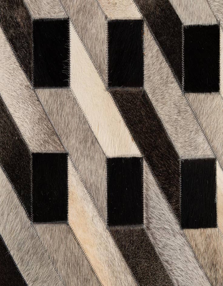 Detail image of  5' 2 x 8' 2 Cowhide - Patchwork Rug