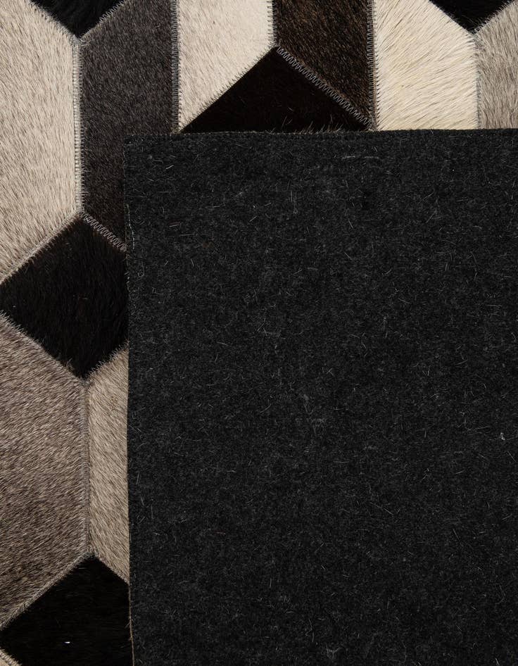 Detail image of  5' 2 x 8' 2 Cowhide - Patchwork Rug