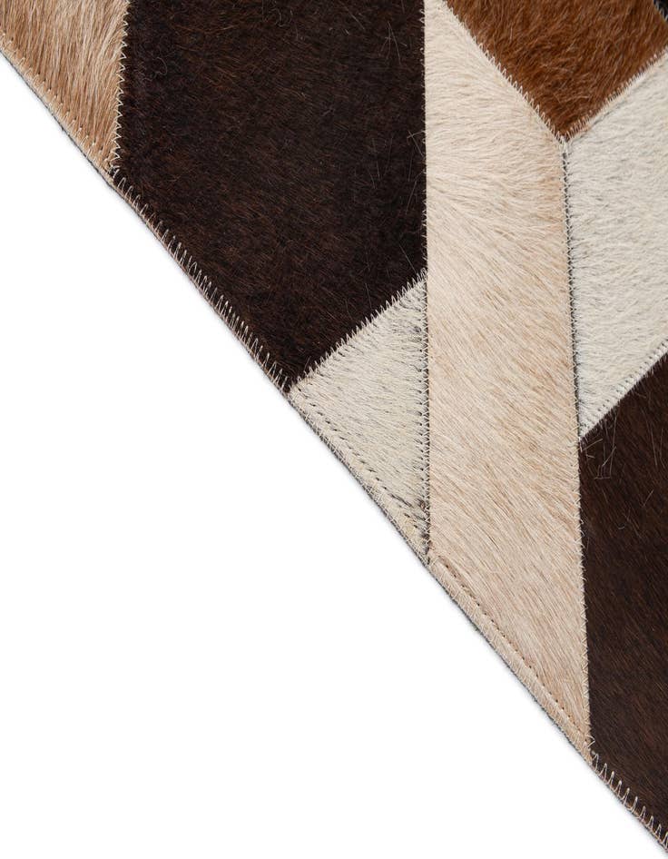 Detail image of  5' 2 x 7' 11 Cowhide - Patchwork Rug