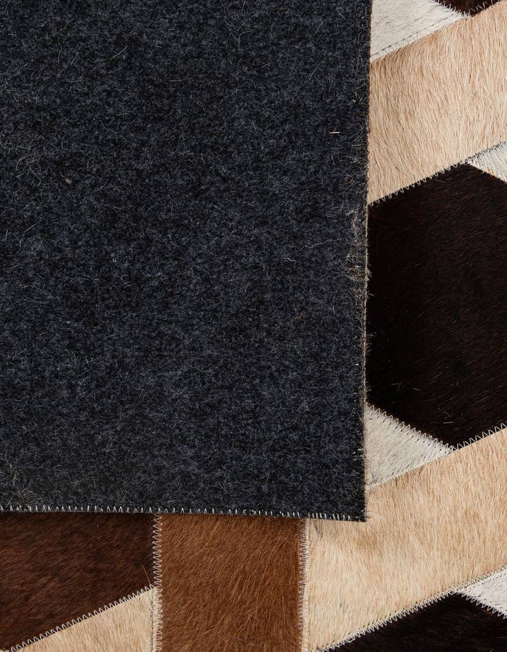 Detail image of  5' 2 x 7' 11 Cowhide - Patchwork Rug