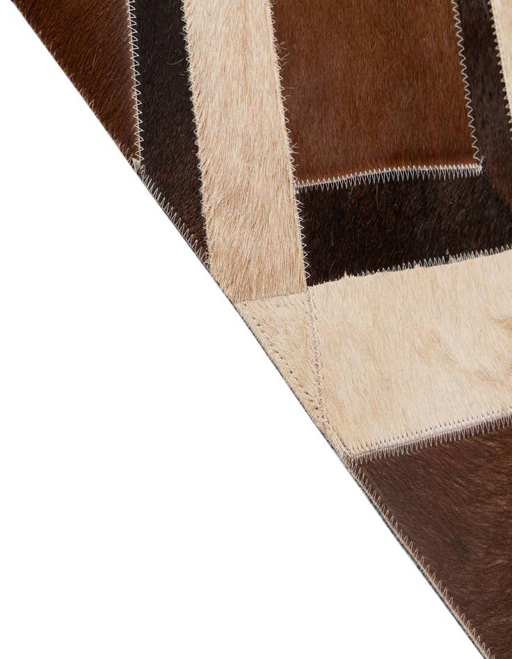 Detail image of  5' 2 x 8' Cowhide - Patchwork Rug