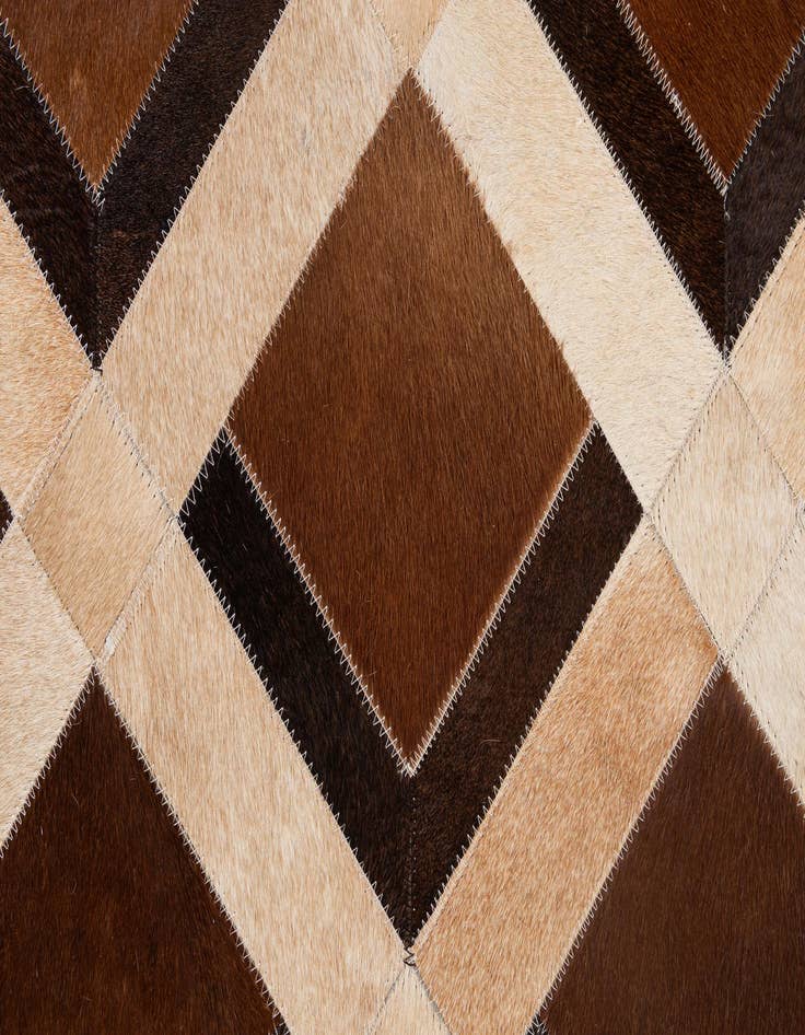 Detail image of  5' 2 x 8' Cowhide - Patchwork Rug
