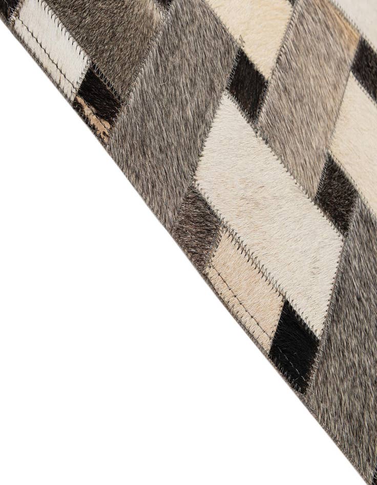 Detail image of  5' 2 x 8' Cowhide - Patchwork Rug