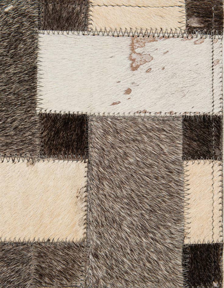 Detail image of  5' 2 x 8' Cowhide - Patchwork Rug