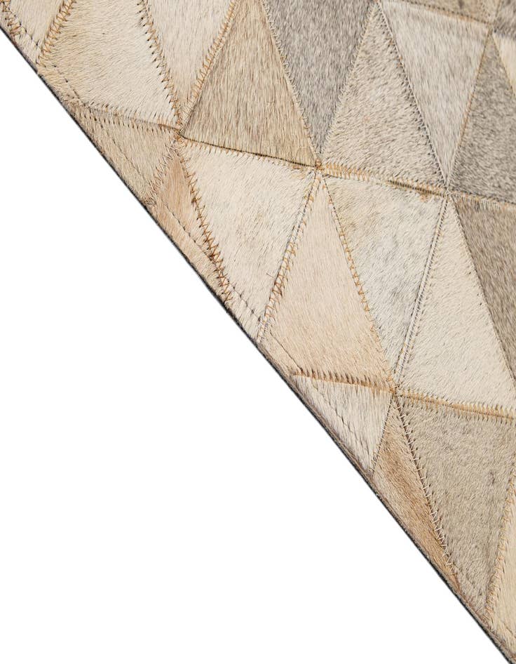 Detail image of  5' 1 x 7' 11 Cowhide - Patchwork Rug