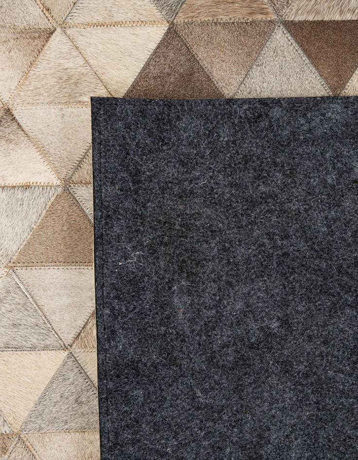 Detail image of  5' 1 x 7' 11 Cowhide - Patchwork Rug