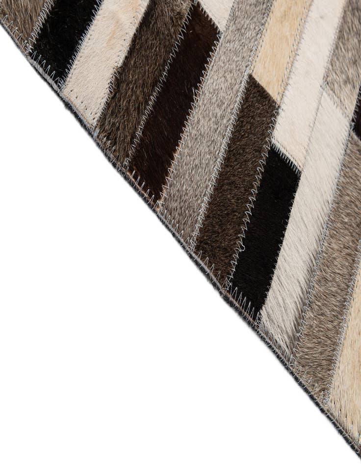 Detail image of  5' 3 x 8' Cowhide - Patchwork Rug