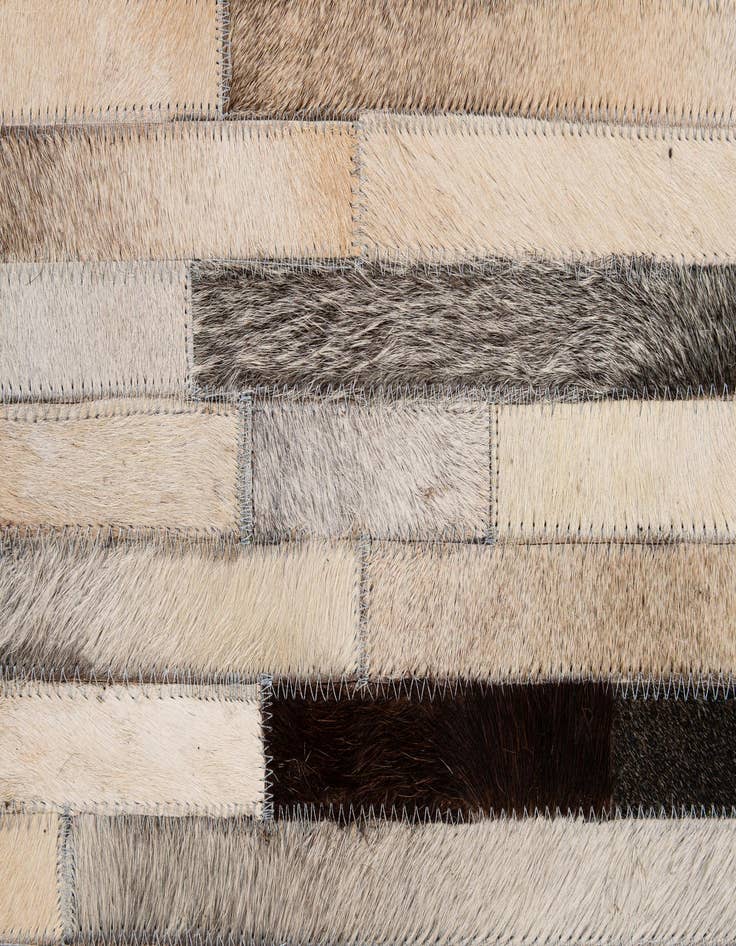 Detail image of  5' 3 x 8' Cowhide - Patchwork Rug