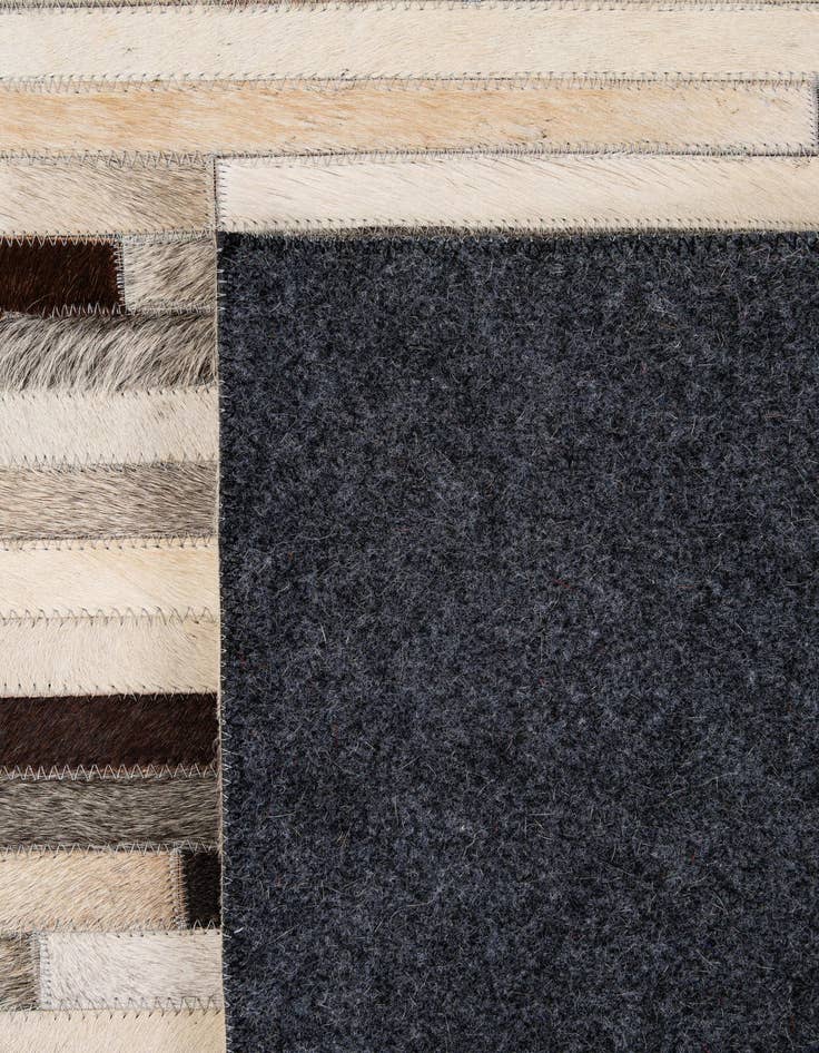 Detail image of  5' 3 x 8' Cowhide - Patchwork Rug