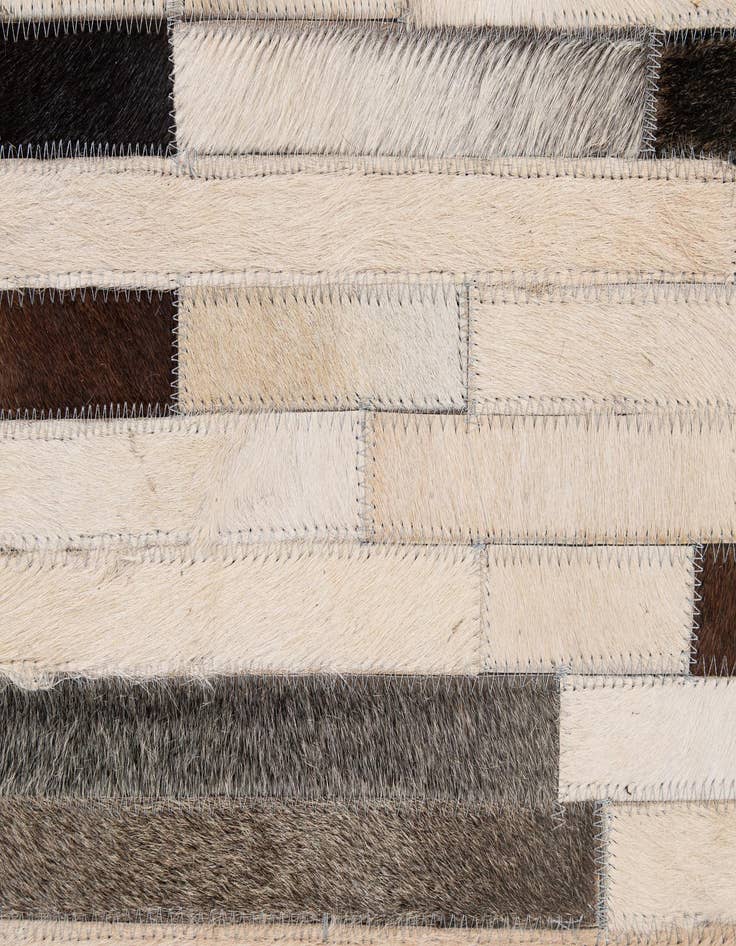 Detail image of  5' 1 x 7' 11 Cowhide - Patchwork Rug