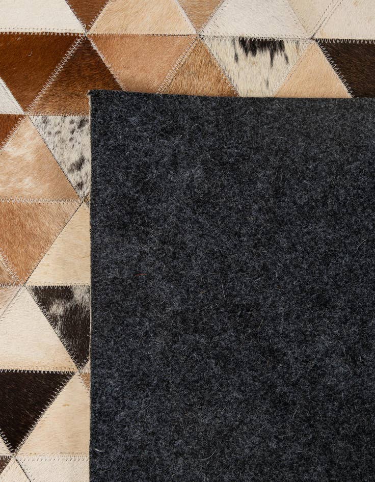 Detail image of  5' x 7' 11 Cowhide - Patchwork Rug