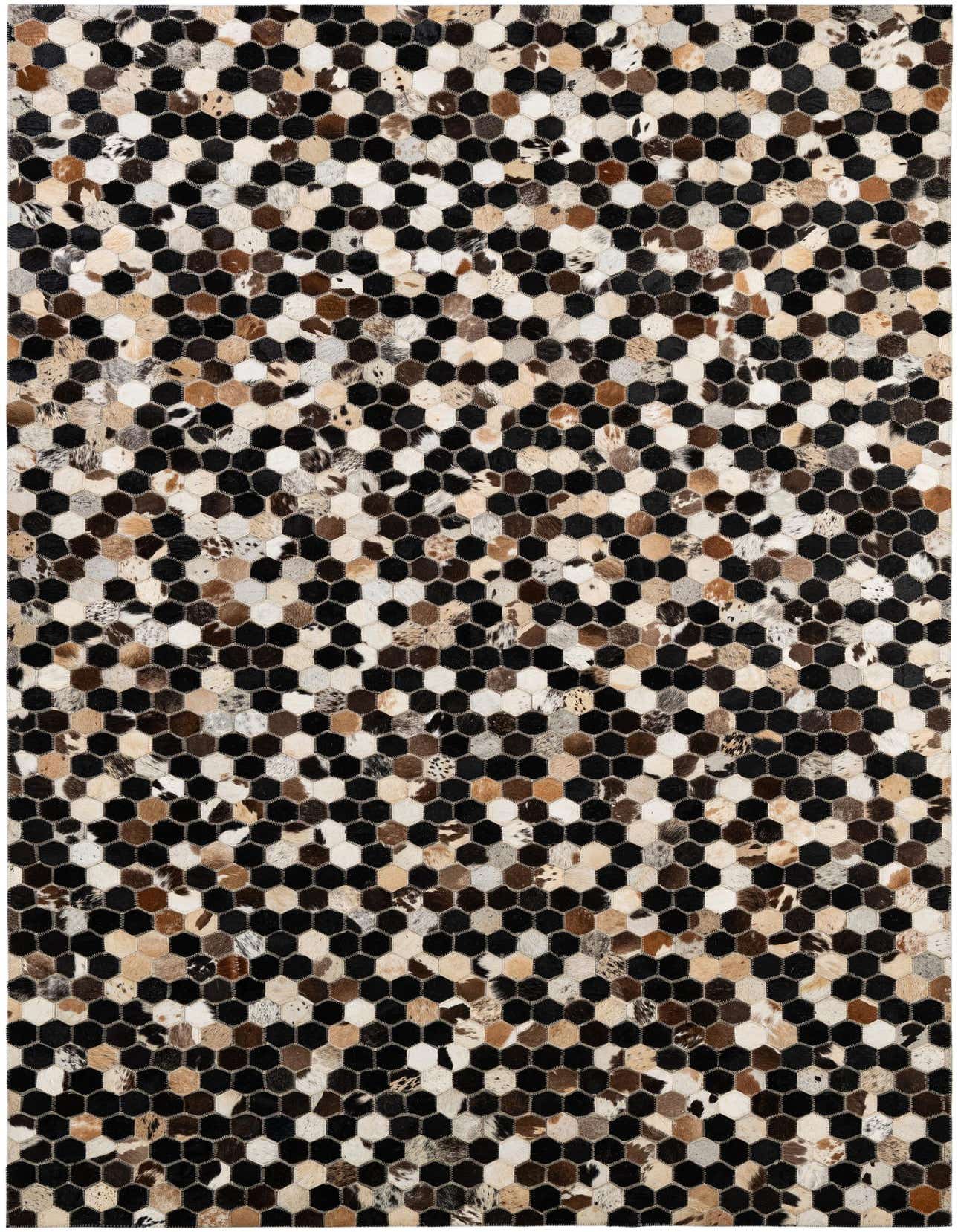 A 5x8 rectangular Cowhide Patchwork rug featuring a modern geometric pattern of multi-colored hexagonal leather and cowhide tiles.