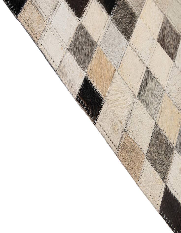 Detail image of  5' 1 x 7' 11 Cowhide - Patchwork Rug