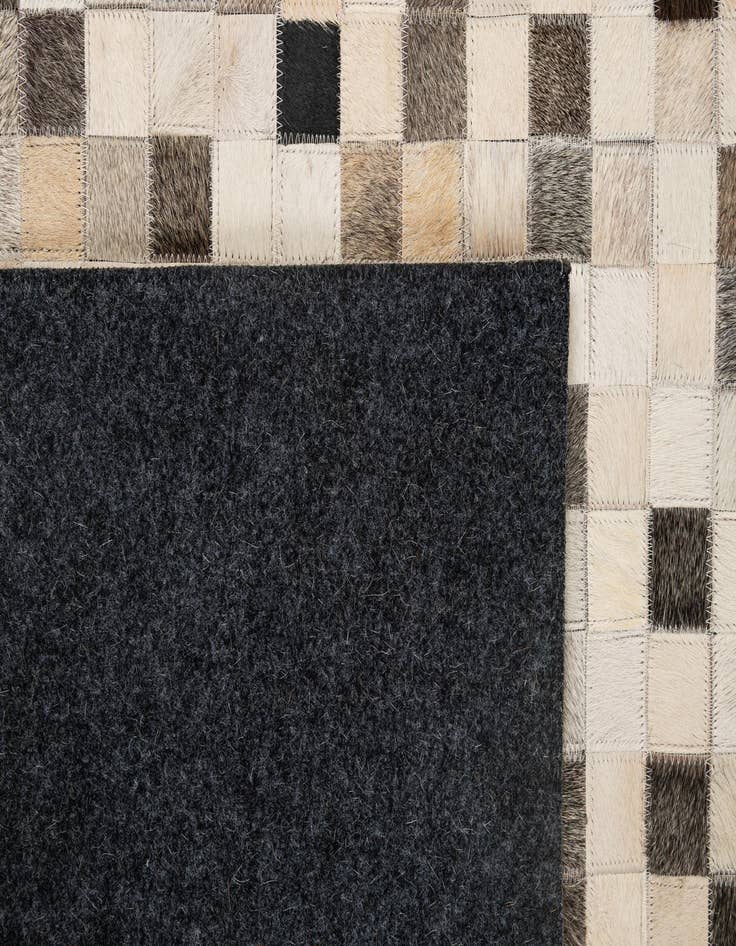 Detail image of  5' 1 x 7' 11 Cowhide - Patchwork Rug