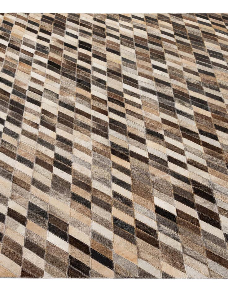 Detail image of  5' 1 x 7' 11 Cowhide - Patchwork Rug