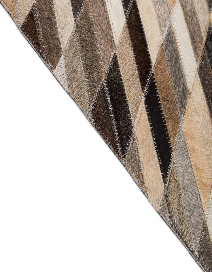 Detail image of  5' 1 x 7' 11 Cowhide - Patchwork Rug