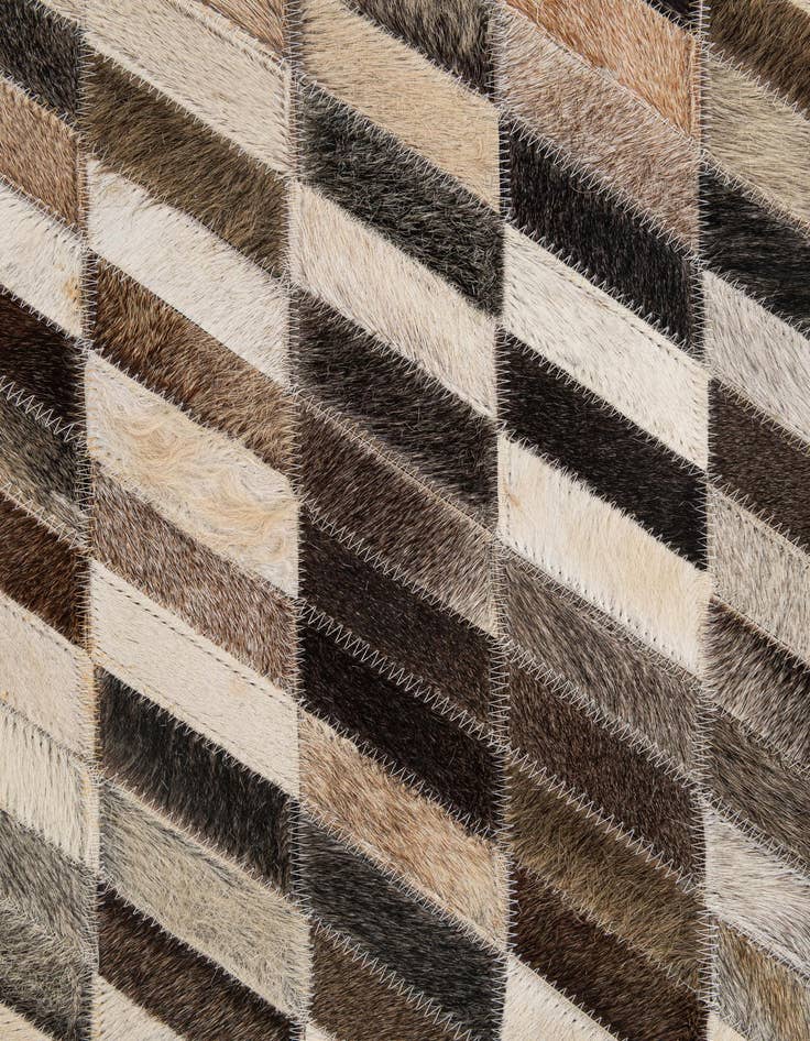 Detail image of  5' 1 x 7' 11 Cowhide - Patchwork Rug