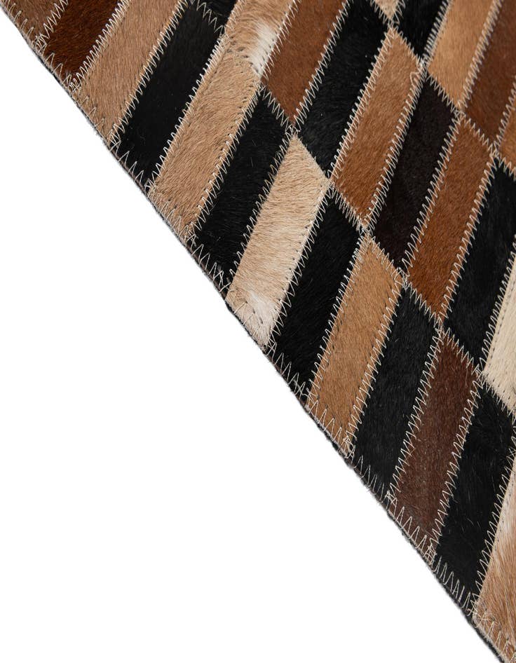 Detail image of  5' 3 x 7' 11 Cowhide - Patchwork Rug