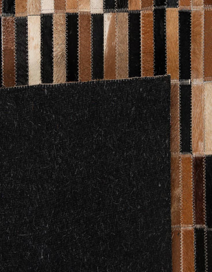 Detail image of  5' 3 x 7' 11 Cowhide - Patchwork Rug