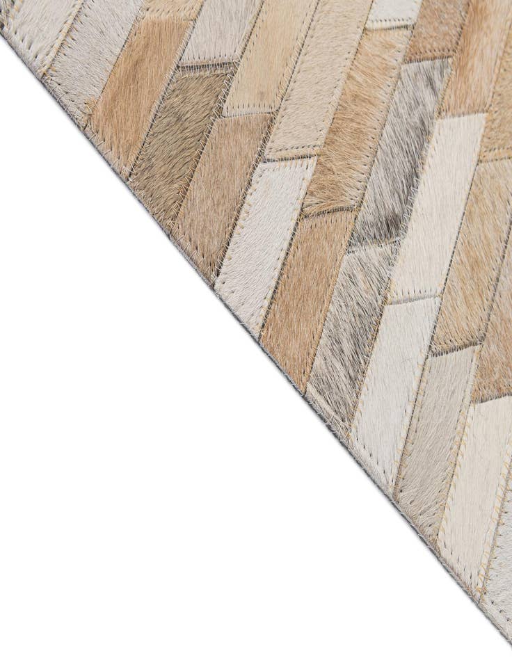 Detail image of  5' 1 x 8' 2 Cowhide - Patchwork Rug
