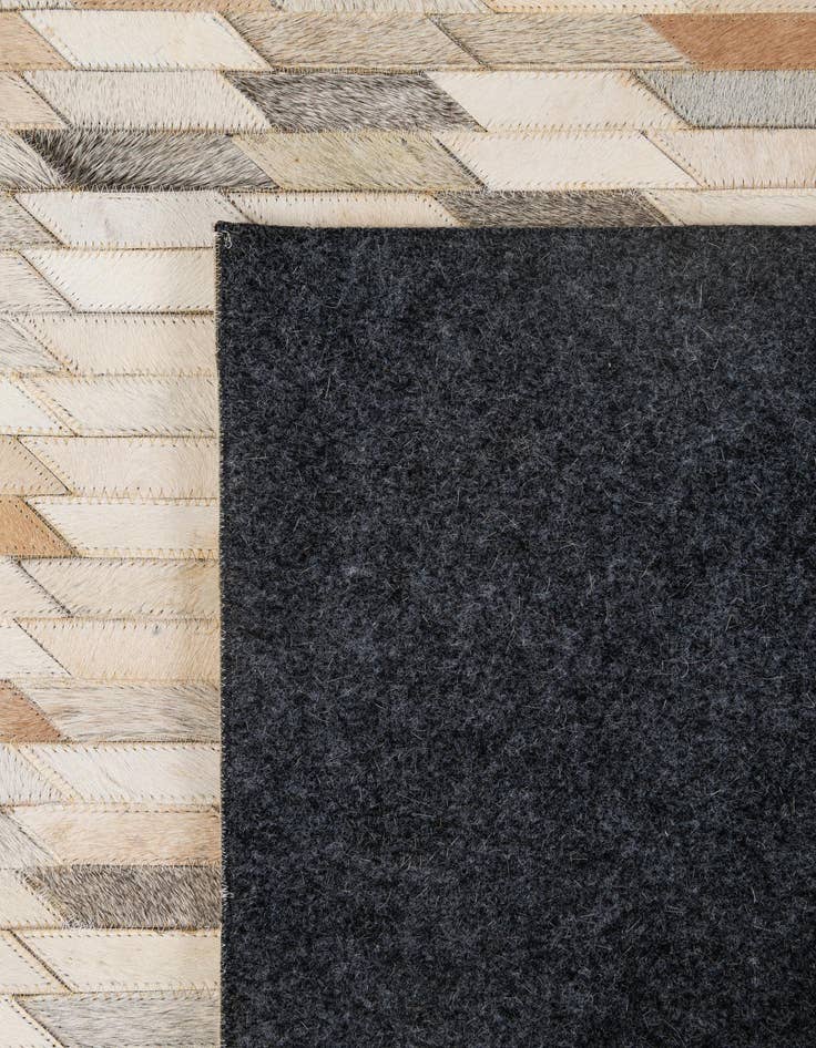 Detail image of  5' 1 x 8' 2 Cowhide - Patchwork Rug