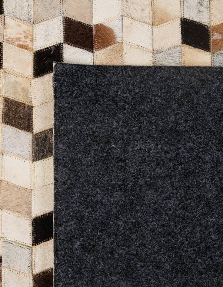 Detail image of  5' 1 x 8' Cowhide - Patchwork Rug