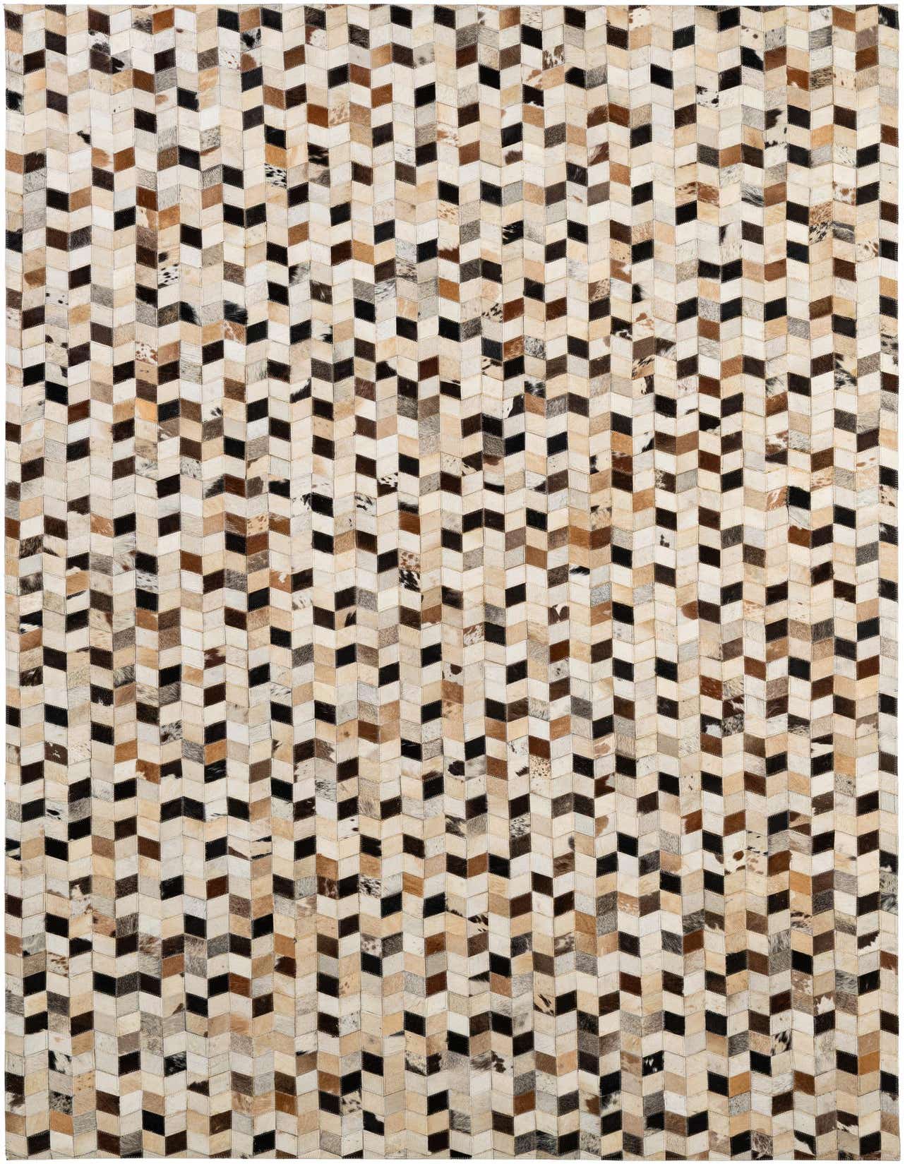 A 5x8 rectangular Cowhide - Patchwork rug featuring a modern chevron pattern in multi-colored natural cowhide and leather.