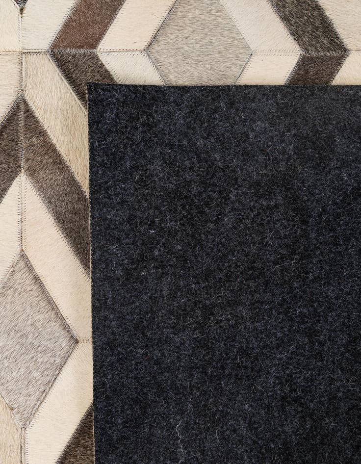 Detail image of  5' 1 x 7' 10 Cowhide - Patchwork Rug