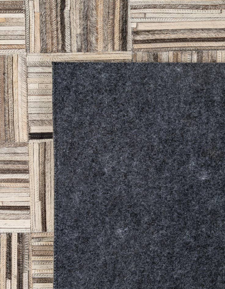 Detail image of  4' 11 x 7' 10 Cowhide - Patchwork Rug