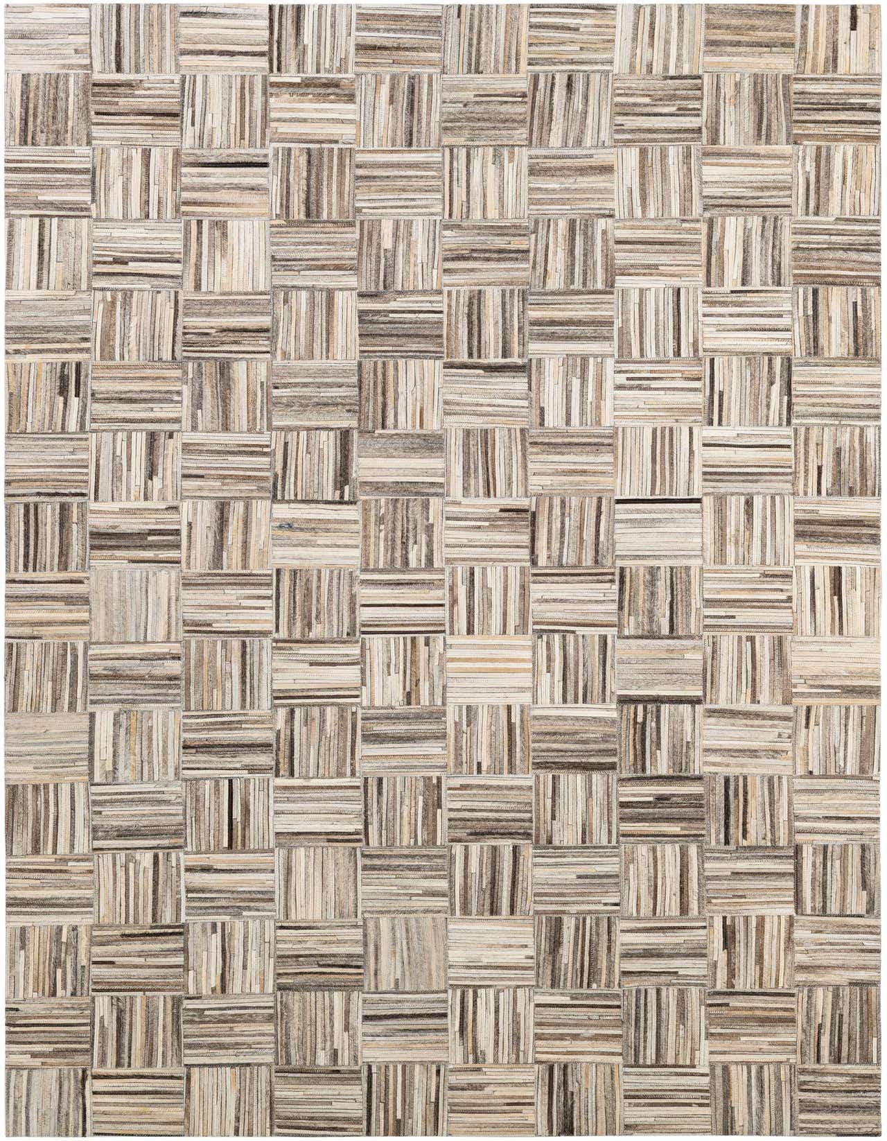 A 5x8 rectangular Cowhide Patchwork rug featuring a modern, multi-colored block pattern in varying natural brown, beige, and cream tones.
