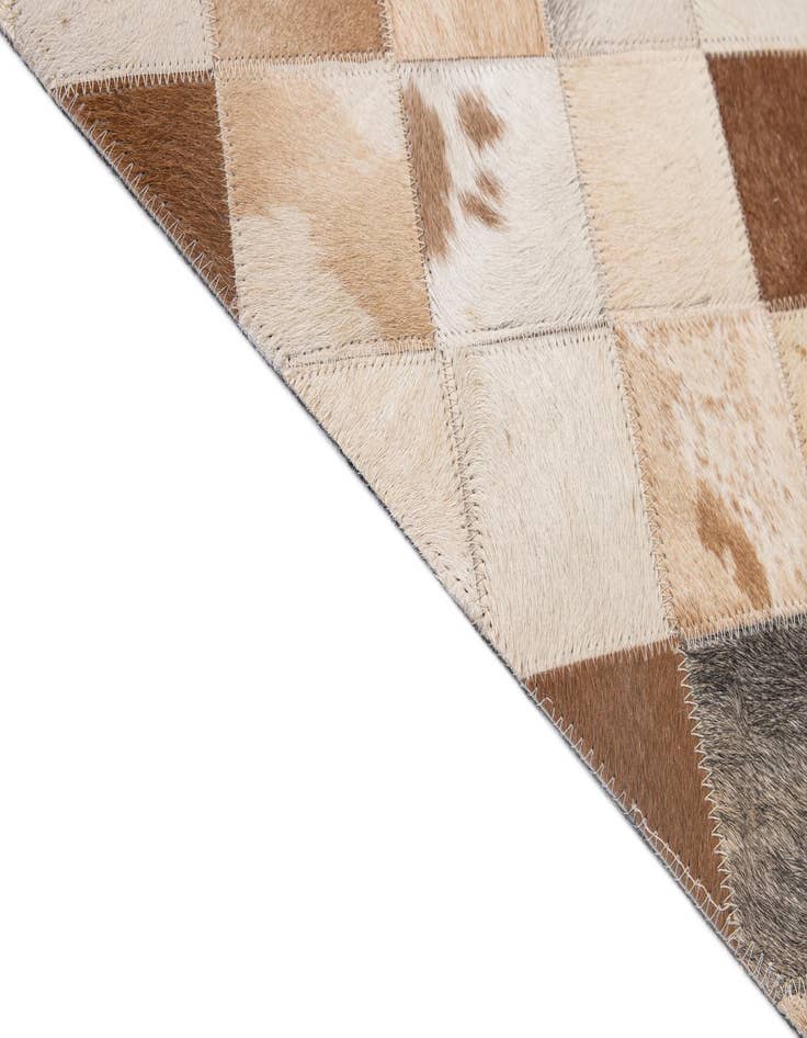 Detail image of  5' 1 x 8' Cowhide - Patchwork Rug