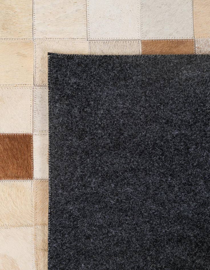 Detail image of  5' 1 x 8' 1 Cowhide - Patchwork Rug