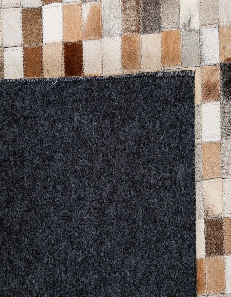 Detail image of  5' 1 x 8' 1 Cowhide - Patchwork Rug