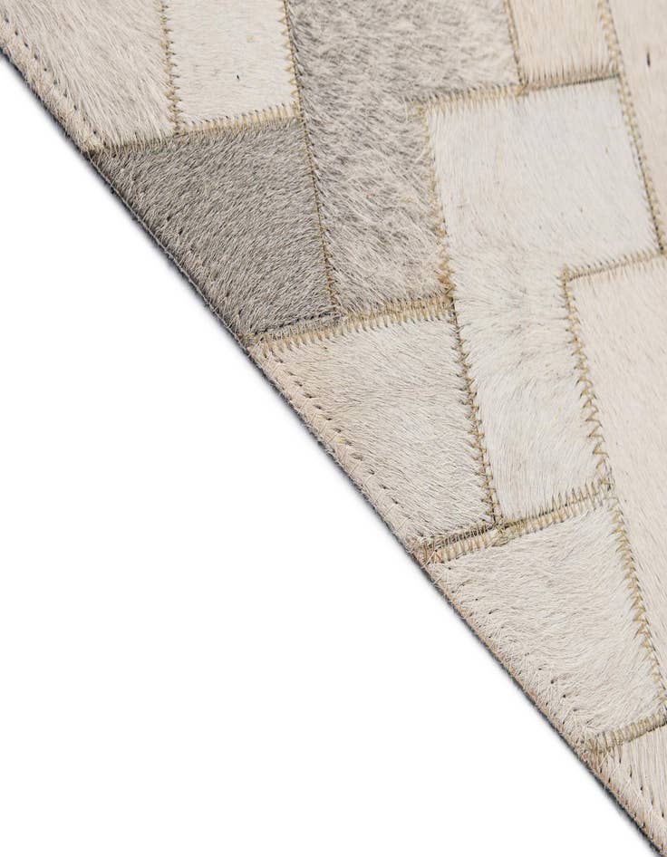 Detail image of  5' 2 x 8' Cowhide - Patchwork Rug
