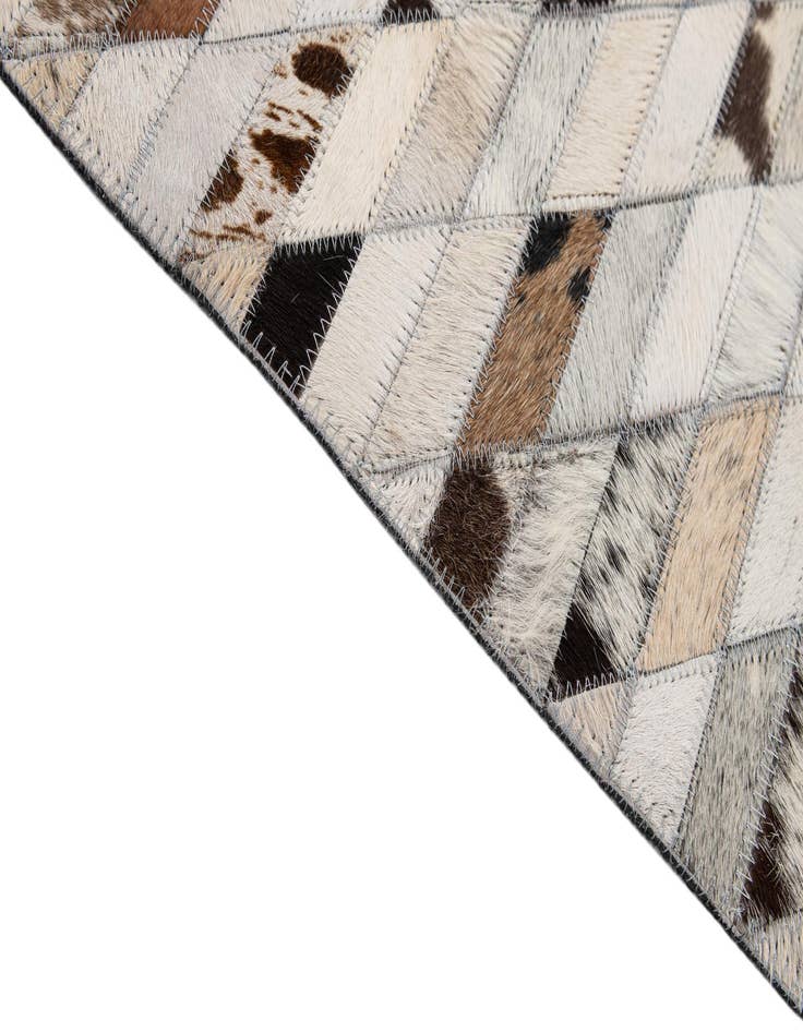 Detail image of  5' 1 x 7' 10 Cowhide - Patchwork Rug