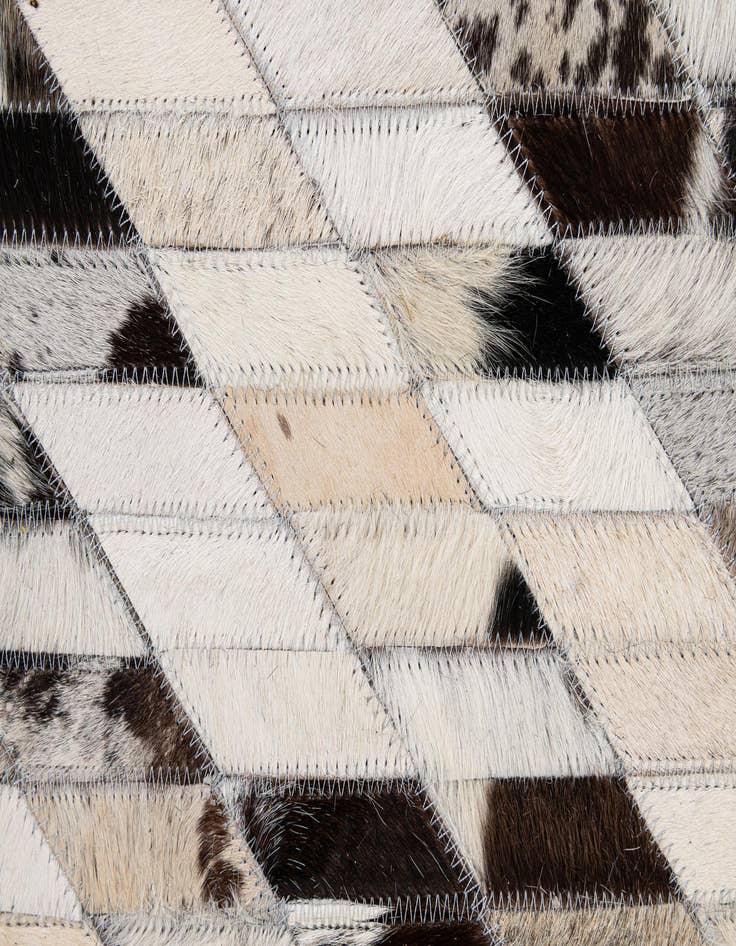 Detail image of  5' 1 x 7' 10 Cowhide - Patchwork Rug