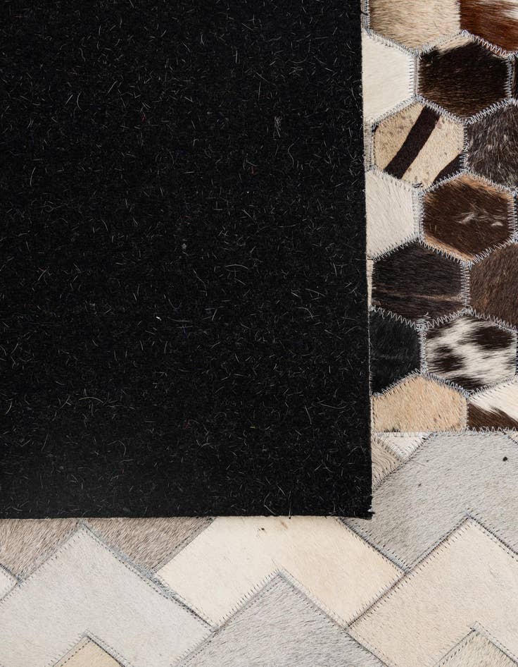 Detail image of  4' 11 x 8' 1 Cowhide - Patchwork Rug