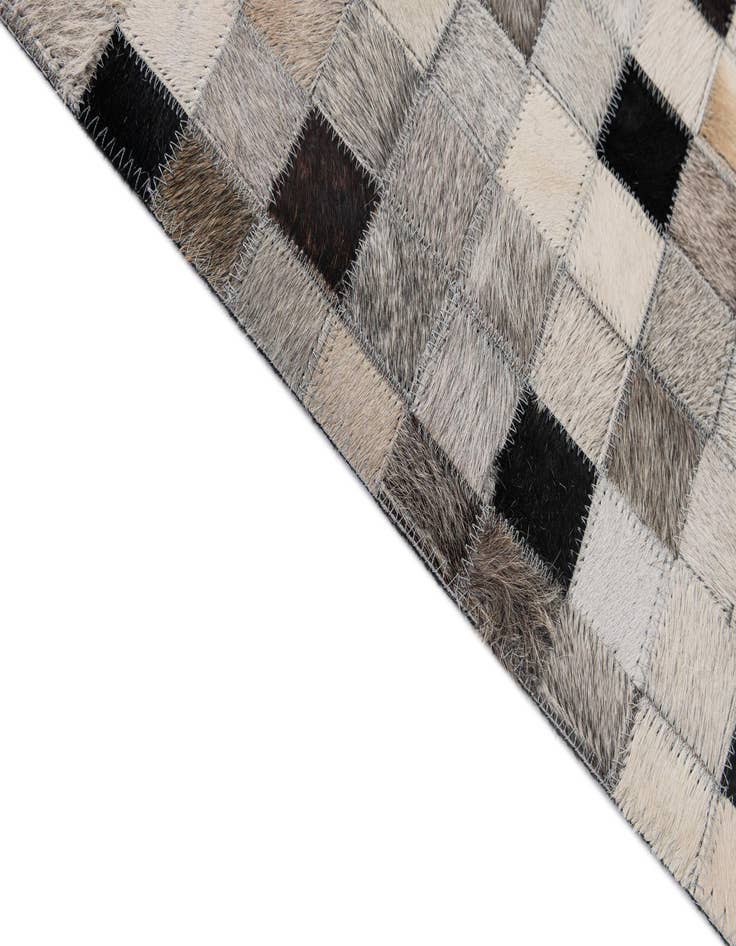 Detail image of  5' 2 x 8' 2 Cowhide - Patchwork Rug
