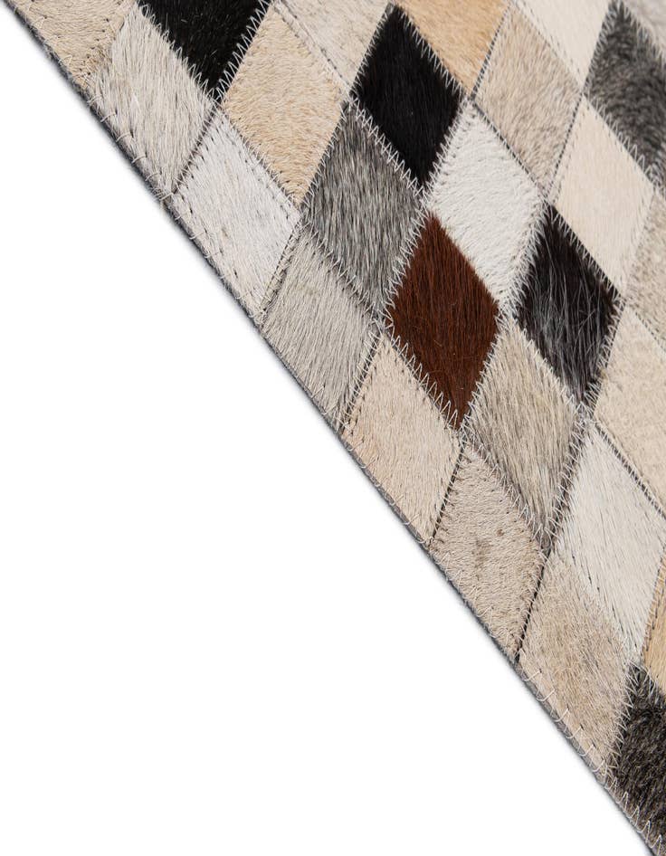 Detail image of  4' 11 x 8' 2 Cowhide - Patchwork Rug
