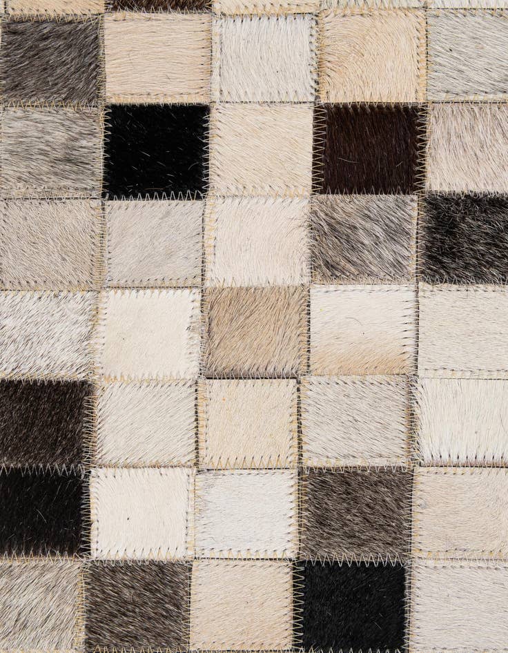 Detail image of  4' 11 x 8' 2 Cowhide - Patchwork Rug