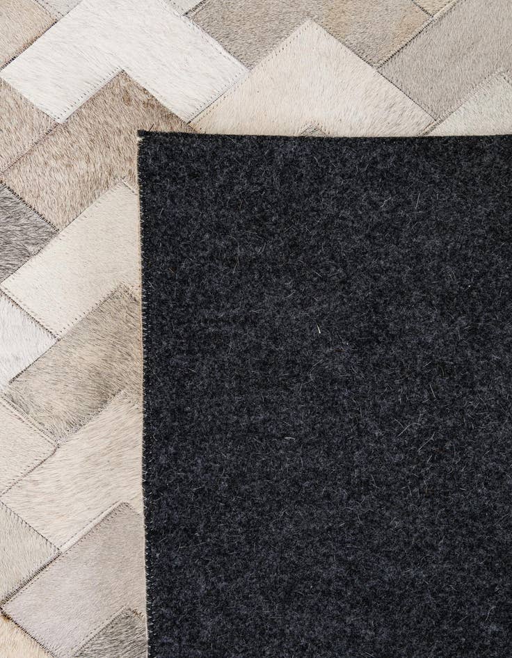 Detail image of  5' 3 x 8' 1 Cowhide - Patchwork Rug