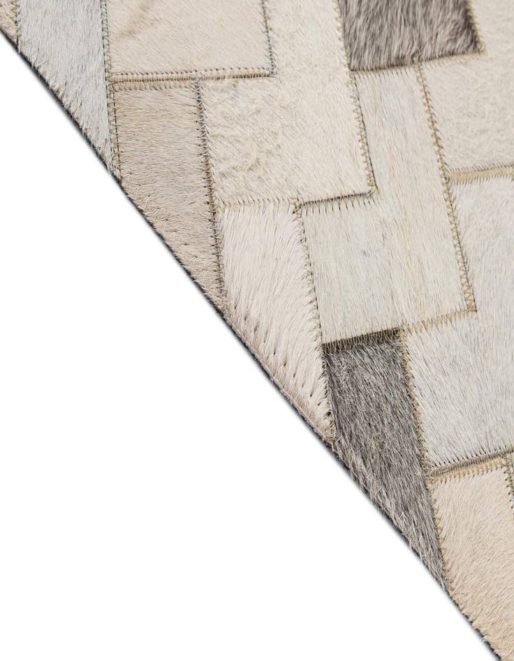 Detail image of  5' 3 x 7' 11 Cowhide - Patchwork Rug