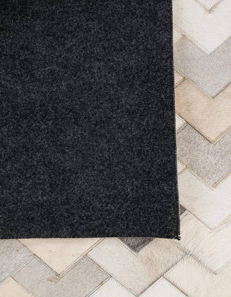 Detail image of  5' 3 x 7' 11 Cowhide - Patchwork Rug