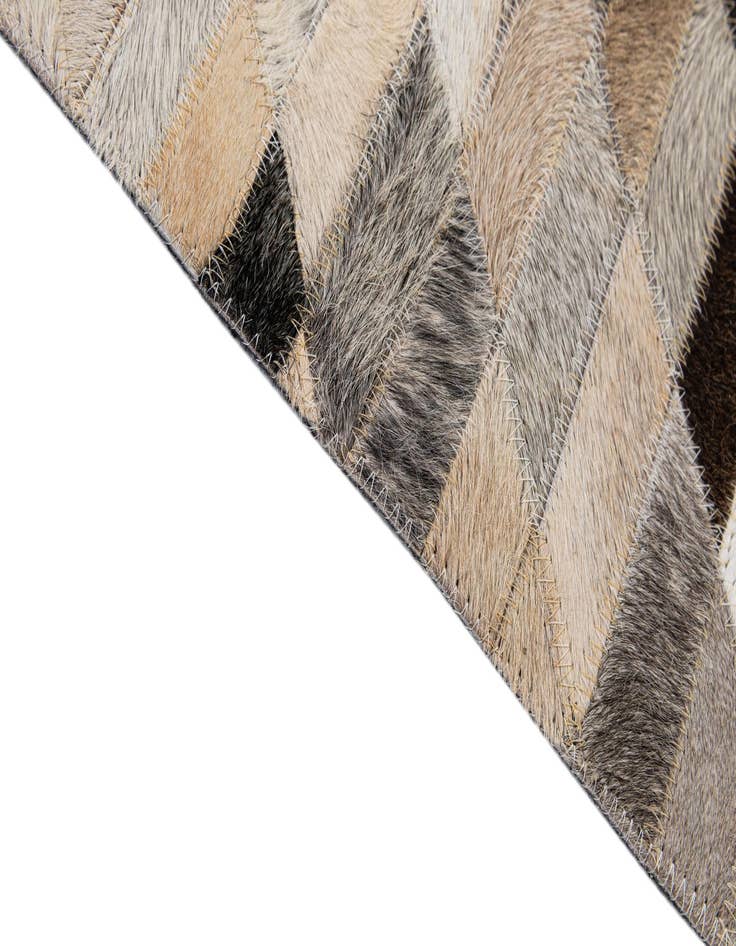 Detail image of  5' 1 x 7' 10 Cowhide - Patchwork Rug