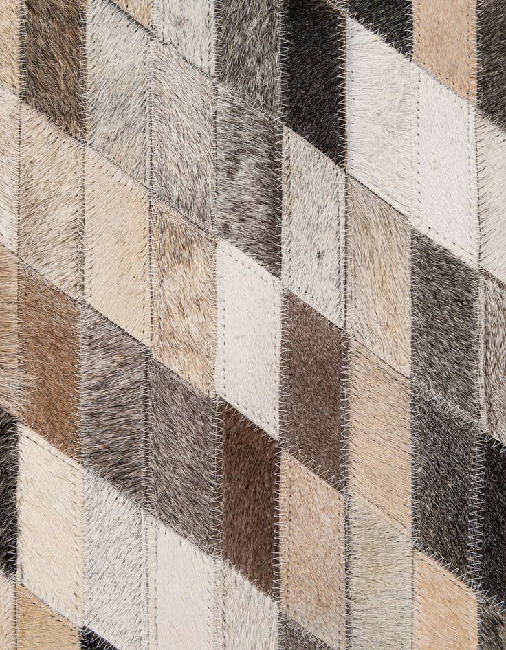 Detail image of  5' 1 x 7' 10 Cowhide - Patchwork Rug