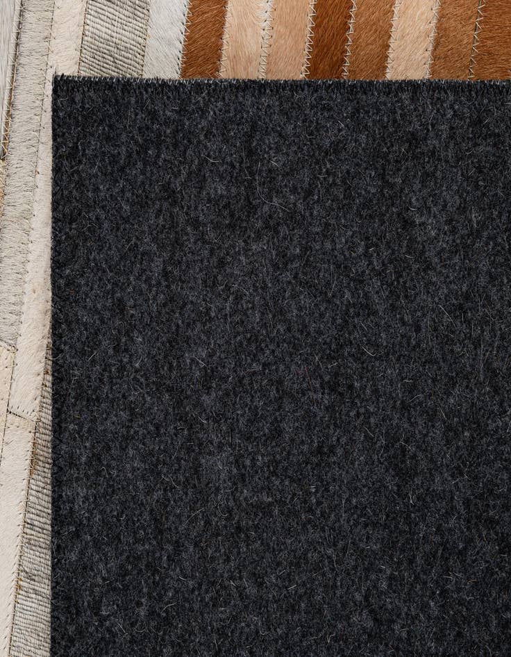 Detail image of  5' 1 x 8' Cowhide - Patchwork Rug